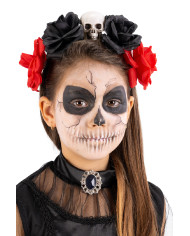Serre-tête avec tête de mort et fleurs, avec étiquette cartonnée pliée Serre-tête avec tête de mort et fleurs, avec étiquette cartonnée pliée