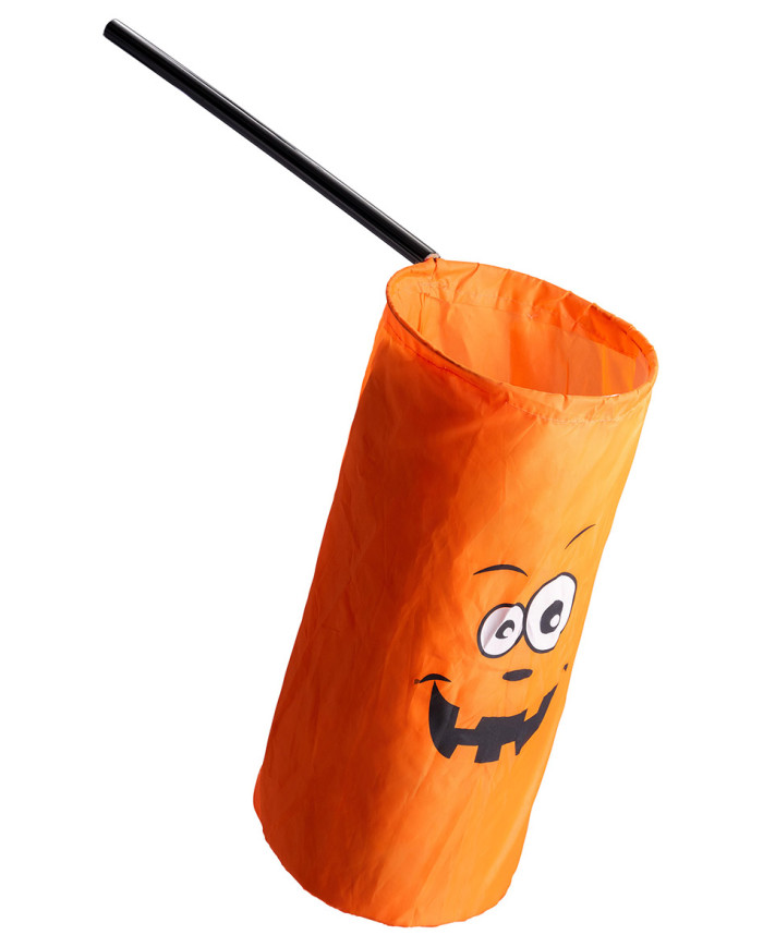 Un bonbon ou un sort orange, avec étiquette volante / étiquette