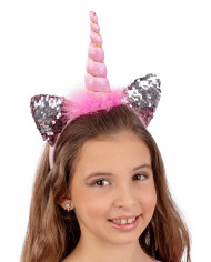 Pink unicorn headband with two ears decorated with reversible