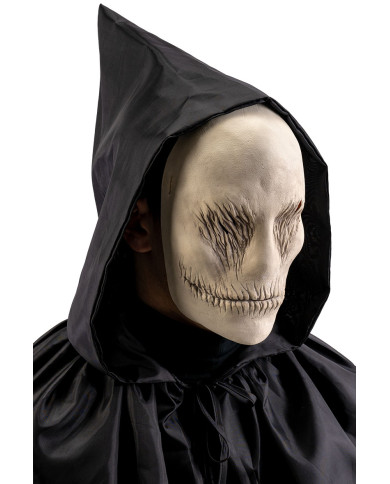 Masque sans visage en latex avec étiquette cartonnée pliée