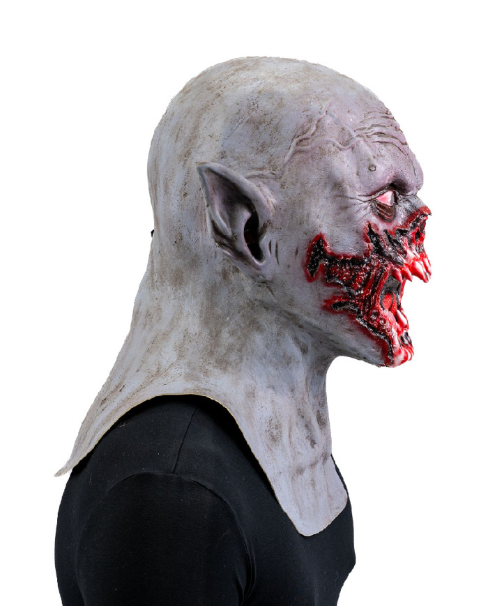 Maschera mostro horror insanguinato in lattice con cavallotto