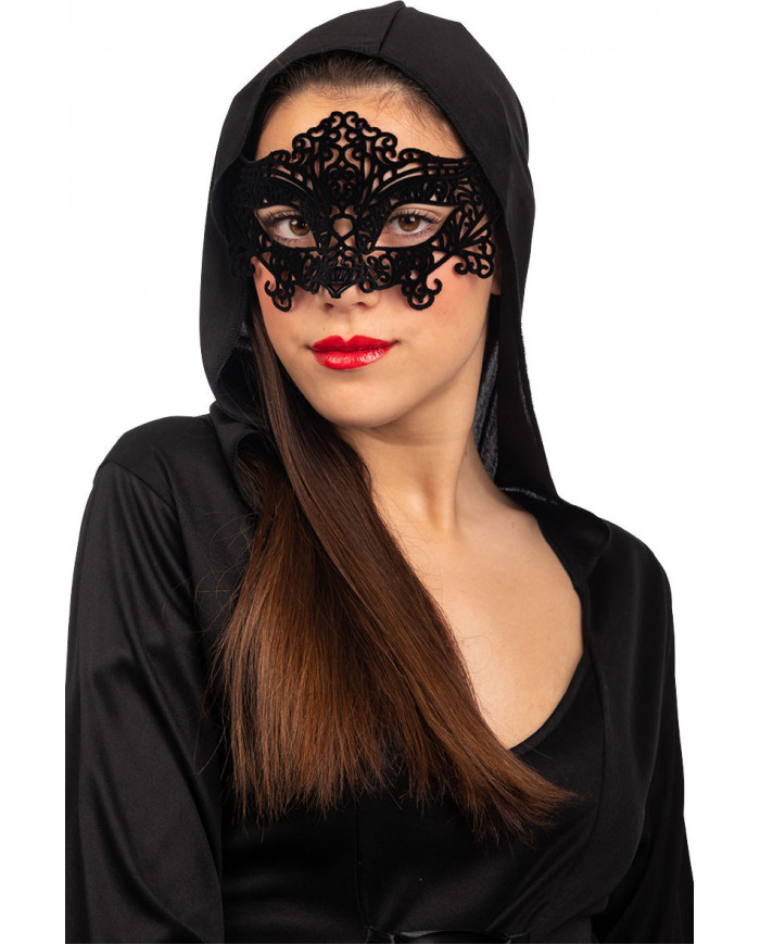 Black domino in carved plastic covered in velvet, an accessory Black domino in carved plastic covered in velvet, an accessory