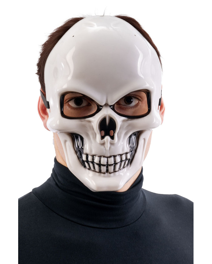 Masque squelette en plastique avec étiquette cartonnée pliée