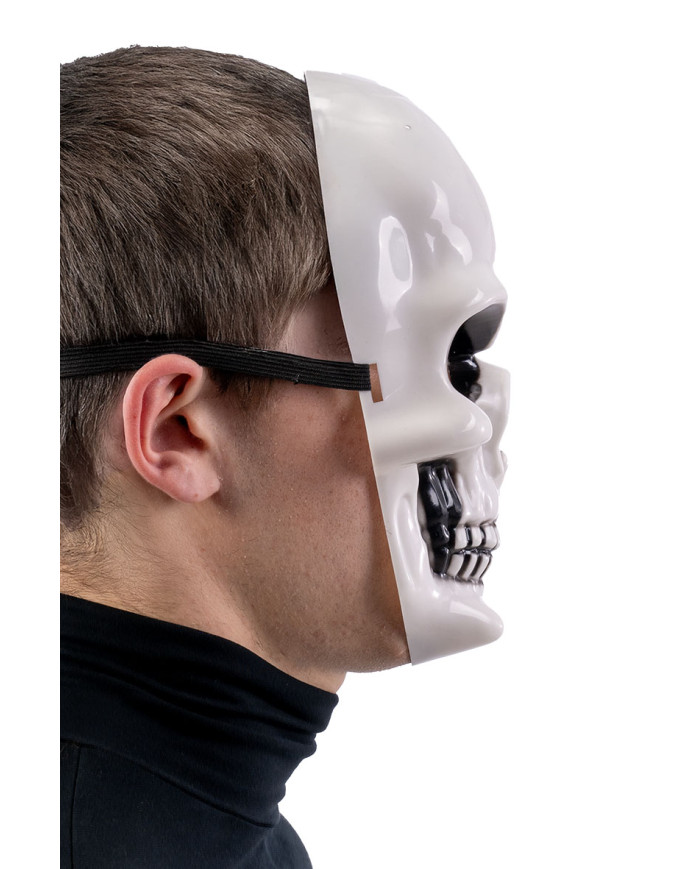 Masque squelette en plastique avec étiquette cartonnée pliée