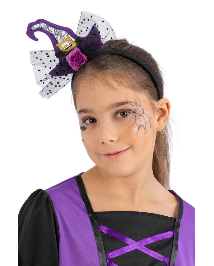 Serre-tête avec chapeau sorcière violet et tulle avec étiquette cartonnée pliée Serre-tête avec chapeau sorcière violet et tulle avec étiquette cartonnée pliée