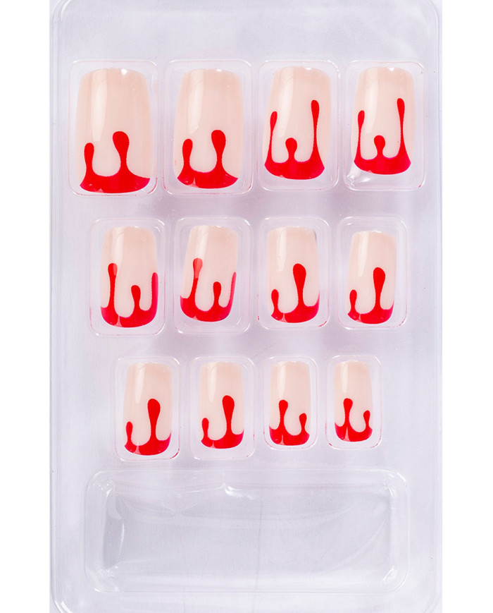 Faux ongles adhésifs sanglants dans une boîte