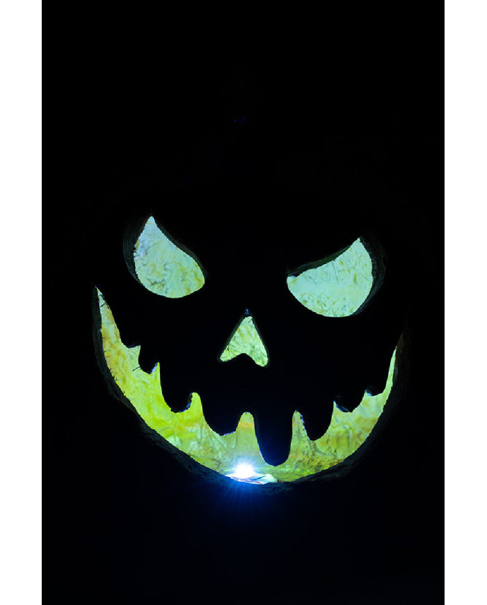 Calabaza decorativa de resina con luces de unos 33 cm de altura en caja