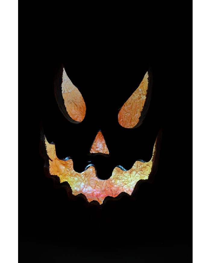 Calabaza decorativa de resina con luces de unos 40 cm de altura en caja