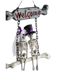 Décoration squelettes sur balançoire à suspendre h. 60 cm x l. 40 cm env. avec étiquette volante / étiquette