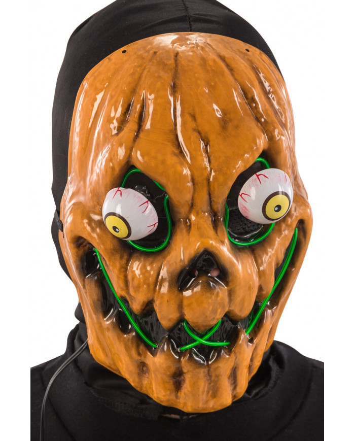 Pumpkin mask in plastic with protruding eyes and bright Pumpkin mask in plastic with protruding eyes and bright