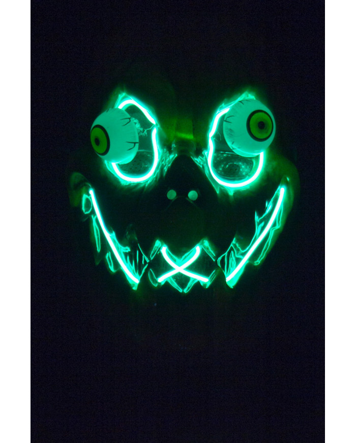 Pumpkin mask in plastic with protruding eyes and bright Pumpkin mask in plastic with protruding eyes and bright
