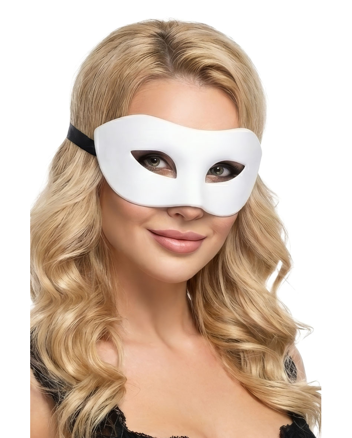 White plastic domino mask on card
