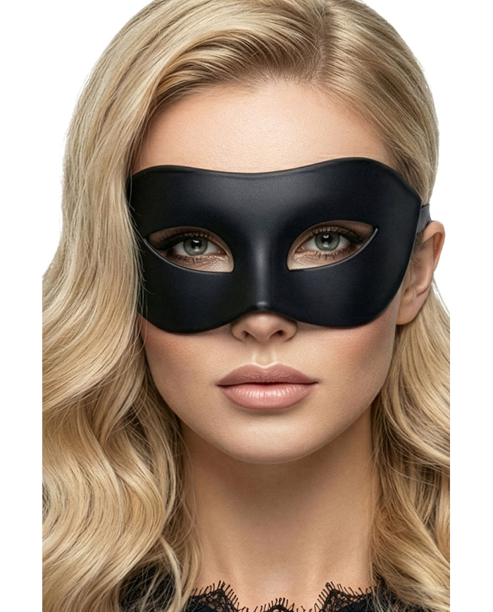 Black plastic domino mask on card