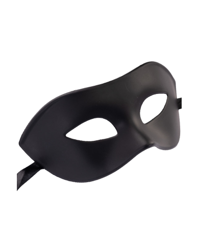 Black plastic domino mask on card