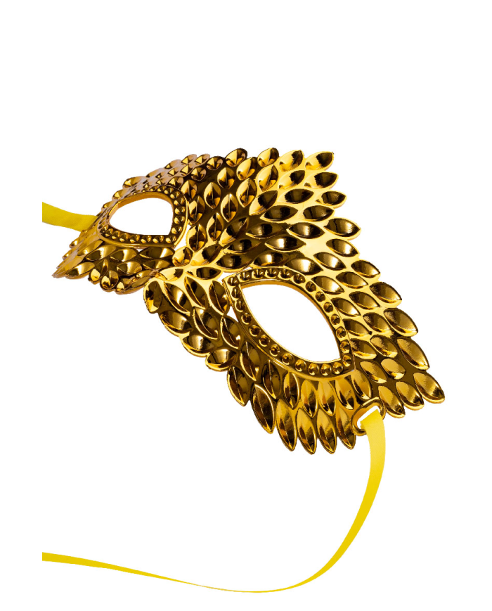 Gold carved mask in plastic on card