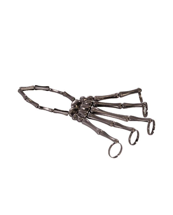Bracelet main squelette avec bagues en métal sur papier cartonné