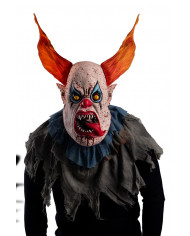 Latex mask depicting a scary clown with orange hair, ideal for