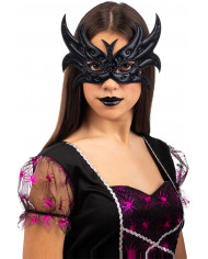 Butterfly in black metallic fabric. Imaginative and shiny