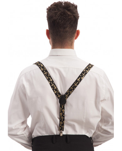 Bretelles noires avec croix et poudre de paillettes dorée dans une