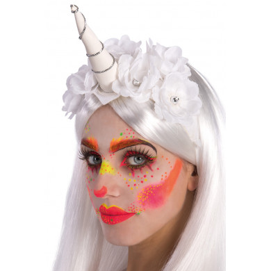 White unicorn headpiece decorated with flowers that is