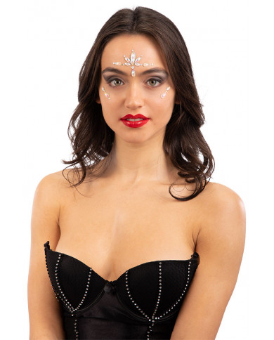 Adhesive face decorations composed of crystals that glow in the