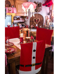 Red cover chair decorated as Santa's jacket, for a warm and