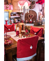 Red cover chair with pon pon and bell for a warm and welcoming