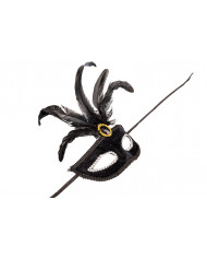 Venetian half-face mask in plastic, covered with black velvet.