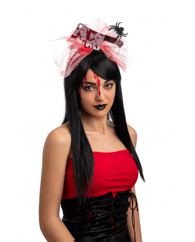 Plastic headband topped with fake hatchet and tulle ribbon with