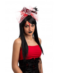 Plastic headband topped with fake hatchet and tulle ribbon with