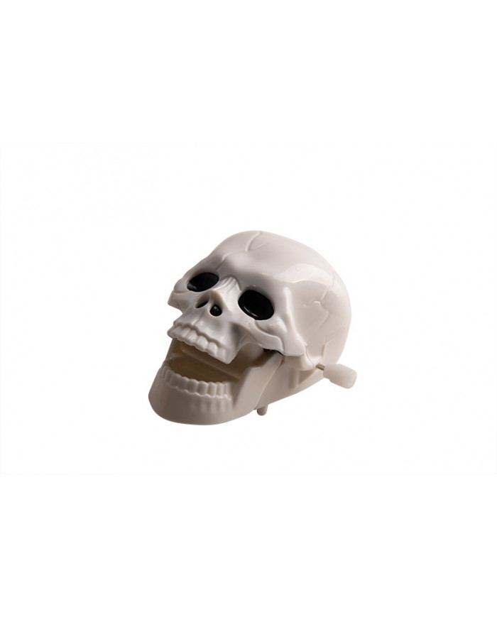 12 plastic wind-up horror skulls on a display stand, with each