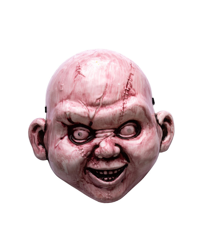 Horrorpuppen-Maske aus Plastik auf Pappkarton Horrorpuppen-Maske aus Plastik auf Pappkarton